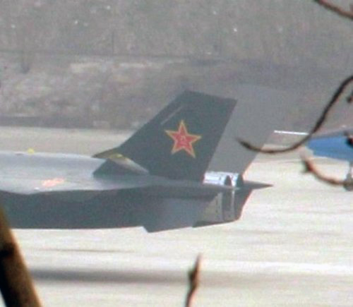 A photo which recently leaked online, has been theorized to be a stealth fighter jet, dubbed a J-20 fighter, for the Chinese military. [Xinhua]