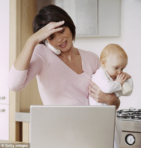 Working mother: A report claims many women do not aspite to balancing a career with raising a family