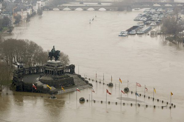 Germany&apos;s famous landmark &apos;Deutsches Eck&apos; (&apos;German Corner&apos;), the junction of the river Moselle and Rhine is flooded in Koblenz January 10, 2011. After weeks of snow and ice, rising temperatures combined with heavy rain means many German rivers have swollen drastically over the last few days, triggering flood warnings in many regions.