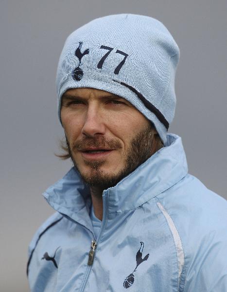 LA Galaxy's David Beckham takes part in a training session at Spurs Lodge in Essex January 11, 2011. (Xinhua/Reuters Photo)