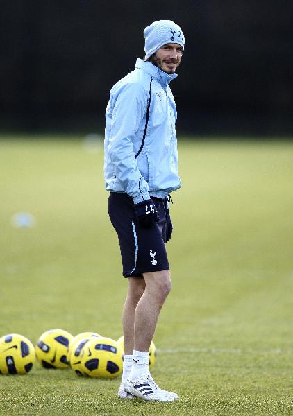 LA Galaxy's David Beckham takes part in a training session at Spurs Lodge in Essex January 11, 2011. (Xinhua/Reuters Photo)