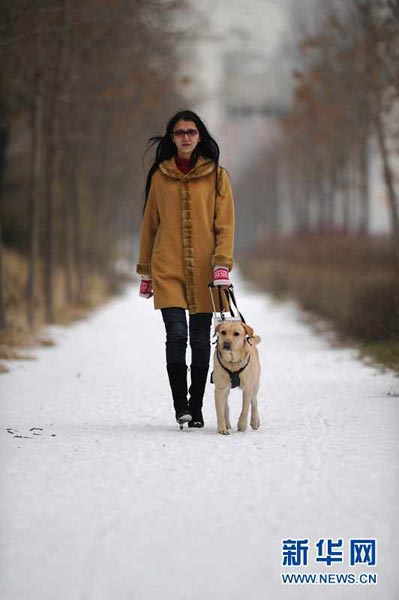 Lin Yan and her guide dog Sherry