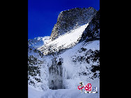The Changbai Mountain is generally acknowledged as the most famous mountain range in Northeast China. It spans the border between China's Jilin Province and North Korea. It takes its Chinese name from the color of the winter snow and the white volcanic pumice scattered on its slopes. [Photo by Tian Gao]