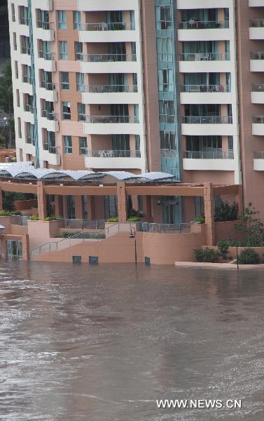 Buildings are soaked in flood water in Brisbane, Queensland, Australia on Jan. 12, 2011. The threat of further flooding is severe in Australia, where almost 20,000 homes in Brisbane were expected to be swamped in the city. Meanwhile, at least ten people have been killed and 78 are missing after flash floods swept across the state of Queensland. (