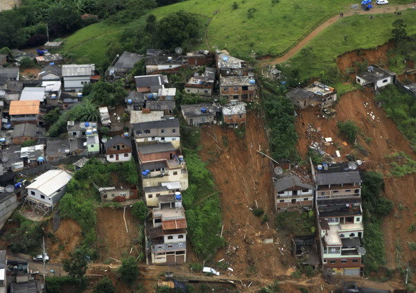 An aerial view of a neighborhood partially destroyed by a landslide caused by heavy rains in Nova Friburgo, Jan 13, 2011. [China Daily/Agencies] 