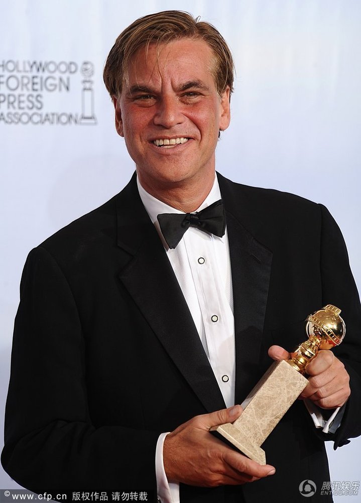 Aaron Sorkin wins best screenplay for The Social Network at the 68th annual Golden Globe Awards in Beverly Hills, California, January 16, 2011.