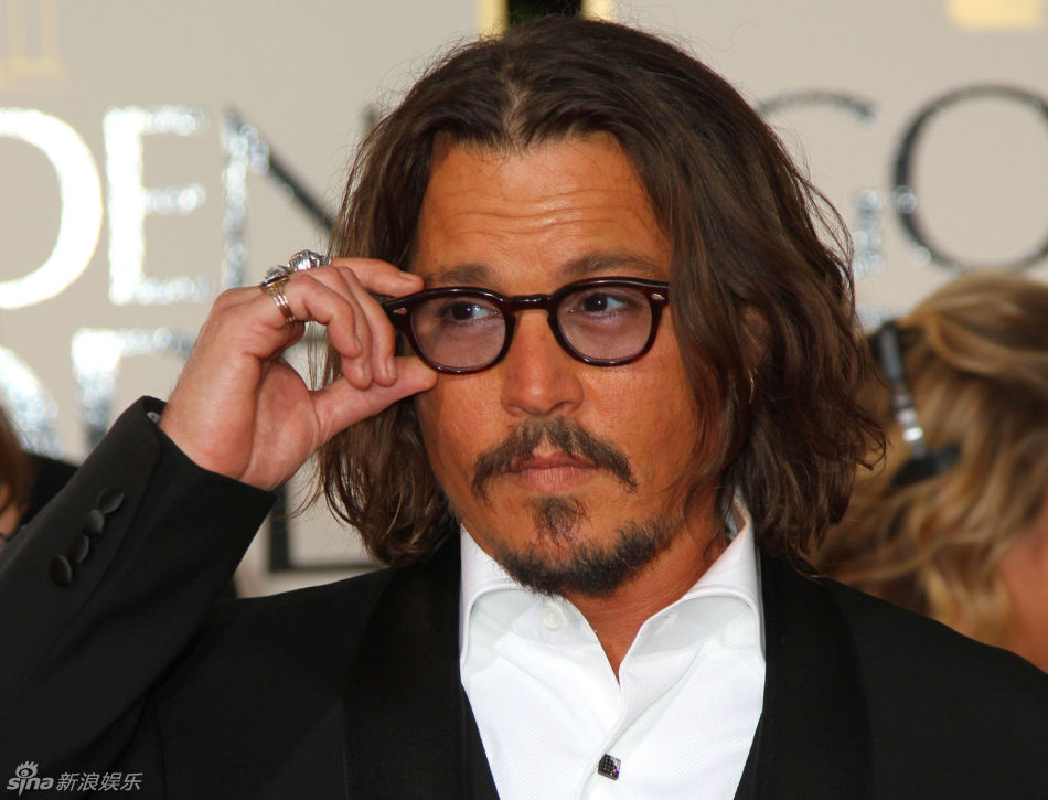 Johnny Depp arrives at the 68th annual Golden Globe Awards in Beverly Hills, California, January 16, 2011.