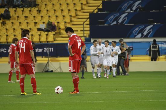 Qatar and Uzbekistan have advanced to the quarterfinals of the Asian Cup football tournament in Doha, after the hosts shut-out Kuwait, 3-0 and Uzbekistan eliminated China with a 2-2 draw. Uzbekistan topped Group A with seven points, one better than Qatar, while China had four and Kuwait ended the tournament.