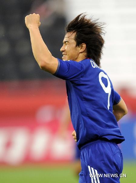 Shinji Okazaki of Japan celebrate for a goal during the Asian Cup group B soccer match against Saudi Arabia in Doha, capital of Qatar, Jan. 17, 2011. Japan won 5-0. (Xinhua/Chen Shaojin)