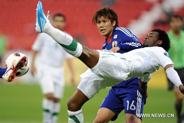 Kamil Mousa (front) of Saudi Arabia competes during the Asian Cup group B soccer match against Japan in Doha, capital of Qatar, Jan. 17, 2011. (Xinhua/Chen Shaojin)