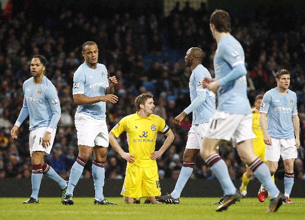 Leicester City's Andy King (C) reacts to a missed chance against Manchester City during their FA Cup soccer match at the City of Manchester Stadium in Manchester, northern England, January 18, 2011. (Xinhua/Reuters Photo)