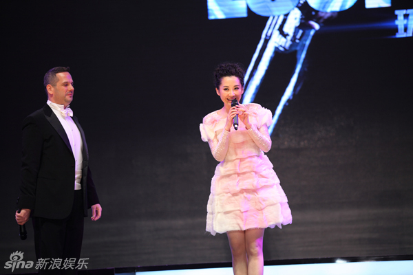 Chinese actress Xu Qing attends a party in a pink dress. She will play in Hollywood film Looper after the Spring Festival.