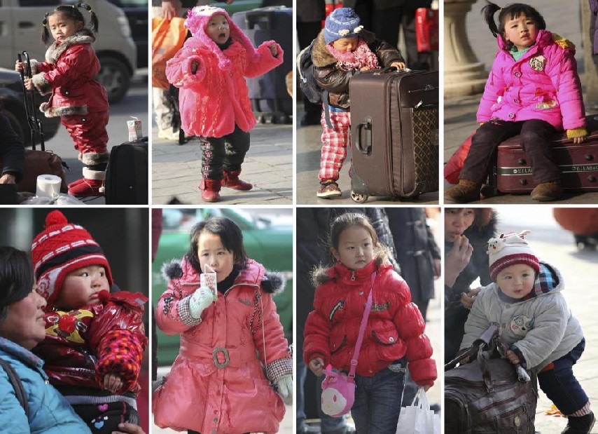 Parents prepare to take their child home at Nanjing railway station in Nanjing, capital city of East China&apos;s Jiangsu province, Jan 9, 2011. [Photo/Xinhua] 