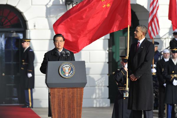Chinese President Hu Jintao speaks at a welcoming ceremony held by U.S. President Barack Obama on the South Lawn of the White House in Washington, the United States, Jan. 19, 2011. [Huang Jingwen/Xinhua]