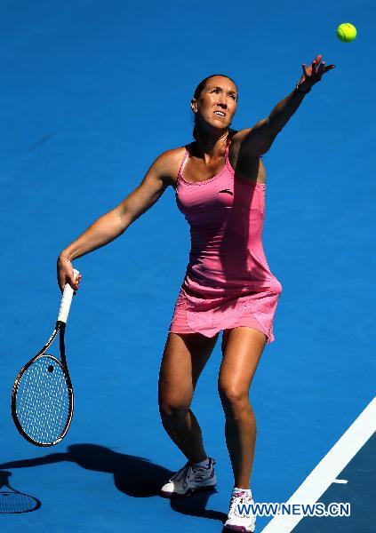 Jelena Jankovic of Serbia serves during the second round match of women's singles against Peng Shuai of China at the Australian Open tennis tournament in Melbourne Jan. 20, 2011. (Xinhua/Meng Yongmin) 