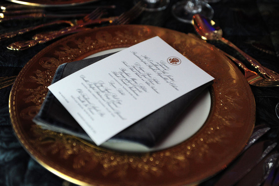 A table setting for the state dinner hosted by US President Barack Obama for President Hu Jintao is shown at the White House in Washington Jan 19, 2011. [Photo/163.com]