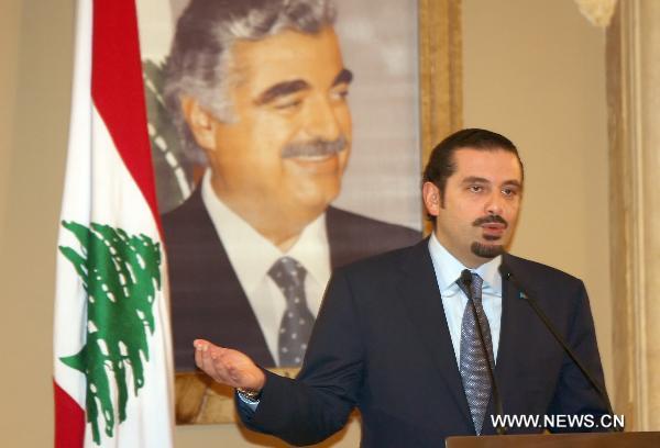 Lebanese Caretaker Prime Minister Saad Hariri speaks in Beirut, Lebanon, Jan. 20, 2011. Hariri said Thursday he will not quit the race to form Lebanon's new cabinet. He said his Future Movement parliamentary block and their Western-backed March 14 Alliance were committed to nominate him in binding consultations to name a new prime minister scheduled to kick off Monday. [Xinhua]