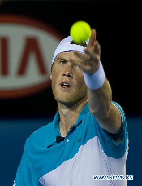 Illya Marchenko of Ukraine serves to Andy Murray of Britain during the second round match of men's singles at the Australian Open tennis tournament in Melbourne Jan. 20, 2011. Marchenko lost 0-3. (Xinhua/Chen Duo) 