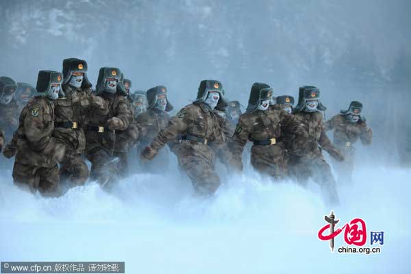 New recruit have a drill session in cold outdoor on January 21, 2011 in Yichun, Heilongjiang province of China. 150 new recruit drill at -32℃ outdoor during the drill session. [Photo/CFP]