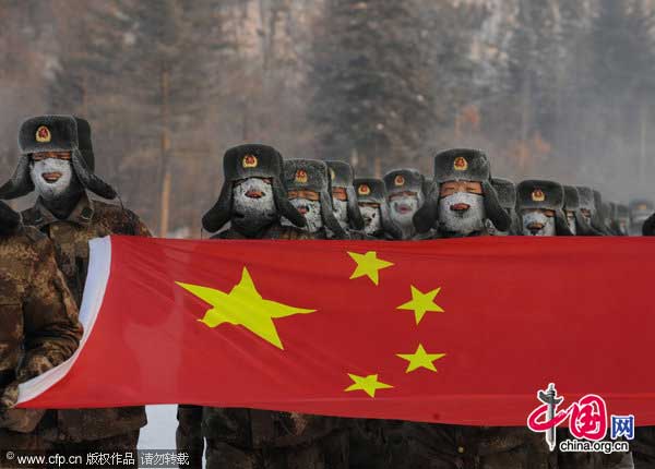New recruit have a drill session in cold outdoor on January 21, 2011 in Yichun, Heilongjiang province of China. 150 new recruit drill at -32℃ outdoor during the drill session. [Photo/CFP]