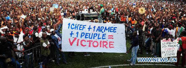 Supporters of Cote d&apos;Ivoire&apos;s incumbent Laurent Gbagbo gather at the Champroux stadium in Abidjan, Cote d&apos;Ivoire, Jan. 23, 2011. [Xinhua] 