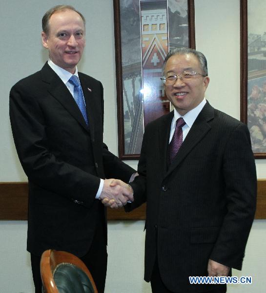 Russia's Security Council Secretary Nikolai Patrushev (L) meets with visiting Chinese State Councilor Dai Bingguo, who is in Moscow for the fifth round of China-Russia strategic security talks, in Moscow, Russia, Jan. 24, 2011. [Lu Jinbo/Xinhua]