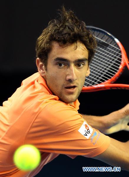Marin Cilic of Croatia competes during the men's singles fourth round match against Rafael Nadal of Spain at the 2011 Australian Open tennis tournament in Melbourne, Australia, Jan. 24, 2011. (Xinhua/Meng Yongmin)