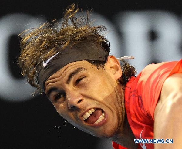 Rafael Nadal of Spain competes during the men's singles fourth round match against Marin Cilic of Croatia at the 2011 Australian Open tennis tournament in Melbourne, Australia, Jan. 24, 2011. (Xinhua/Meng Yongmin)