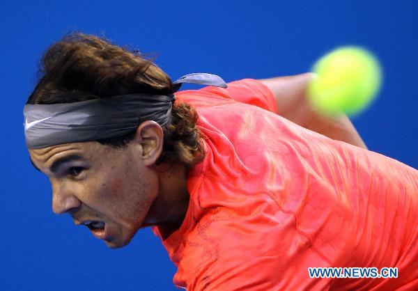 Rafael Nadal of Spain competes during the men's singles fourth round match against Marin Cilic of Croatia at the 2011 Australian Open tennis tournament in Melbourne, Australia, Jan. 24, 2011. (Xinhua/Meng Yongmin) 