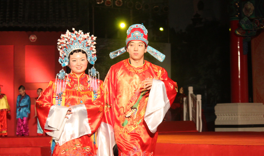 Classic Chinese wedding attire for the bride and groom. 
