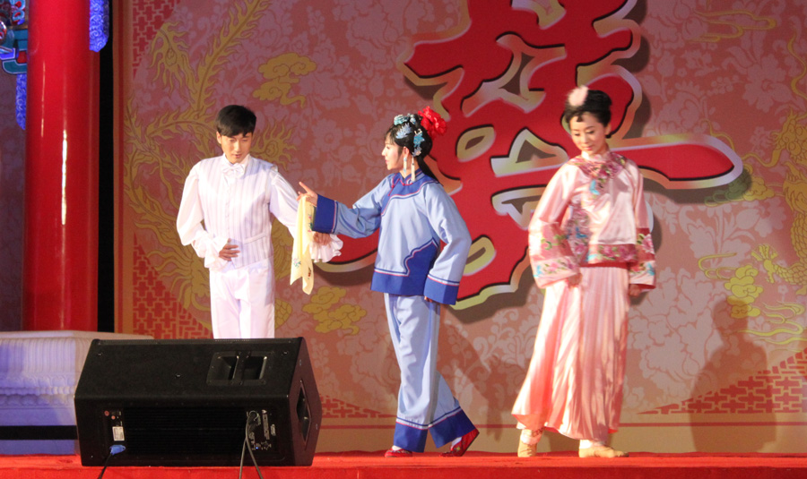 Lovers ask the matchmaker (middle)to persuade their parents to allow their marriage.