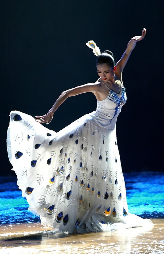 Yang Liping (born 1958), one of China&apos;s most renowned dancers, is from the Bai ethnic group. She has won a reputation for being the Spirit of Dance due to her charming performances, such as The Soul of the Peacock, Two Trees, and Moonlight. [Photo/Agencies]