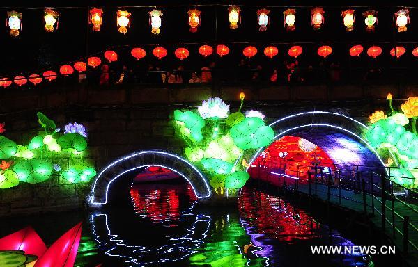 Illuminations are seen during the 17th Zigong International Dinosaur Lantern Festival in Zigong, southwest China's Sichuan Province, Jan. 24, 2011. The lantern festival, which kicked off on Monday, will last for 43 days to celebrate the Chinese Spring Festival which falls on Feb. 3 this year.