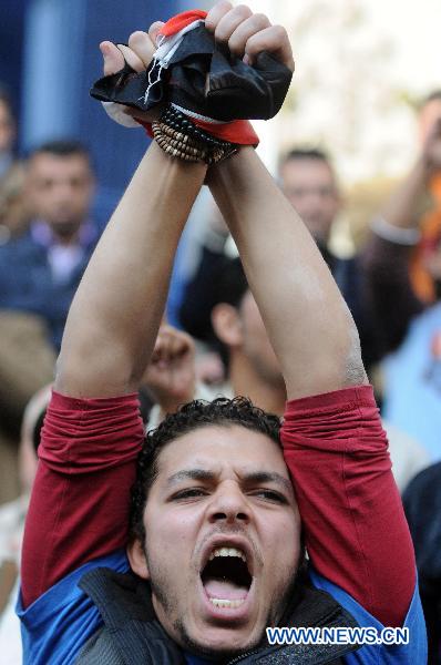 A protester shouts slogans against Egyptian President Hosni Mubarak in Cairo, capital of Egypt, Jan. 26, 2011. [Xinhua]