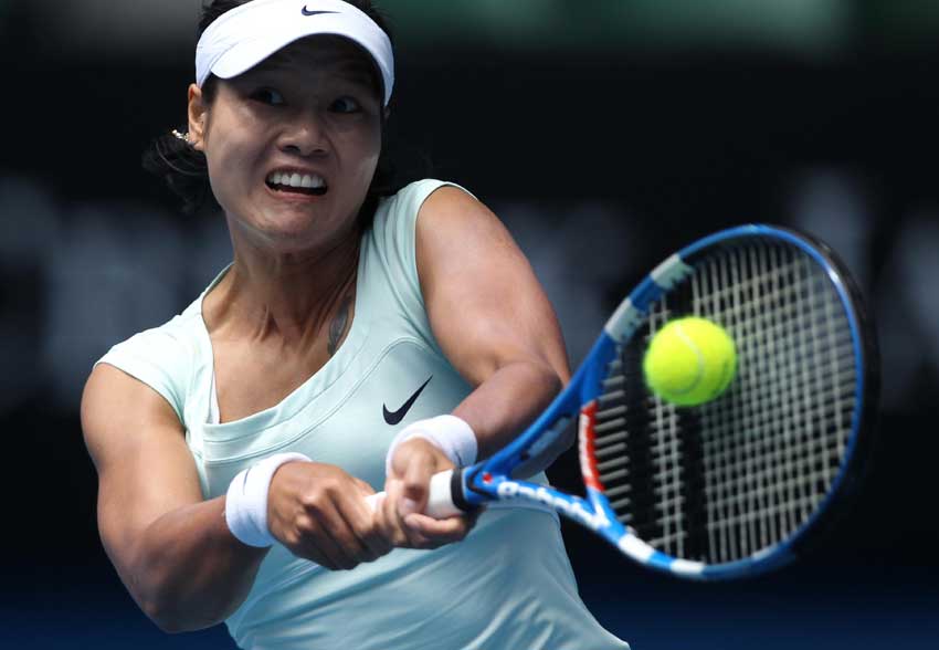 Li Na of China wins semifinal match against Caroline Wozniacki of Denmark during day eleven of the 2011 Australian Open at Melbourne Park on January 27, 2011 in Melbourne, Australia. [Photo/xinhua]