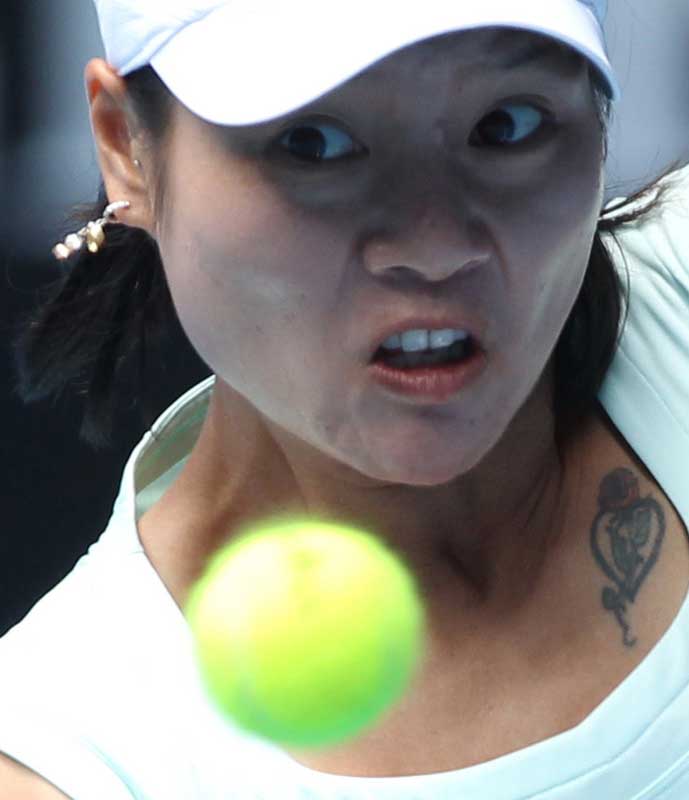 Li Na of China wins semifinal match against Caroline Wozniacki of Denmark during day eleven of the 2011 Australian Open at Melbourne Park on January 27, 2011 in Melbourne, Australia. [Photo/Xinhua]