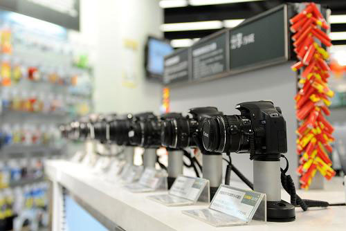 This photo taken on Thursday, January 27, 2011 shows digital cameras in an electronics and appliance store in Beijing. 