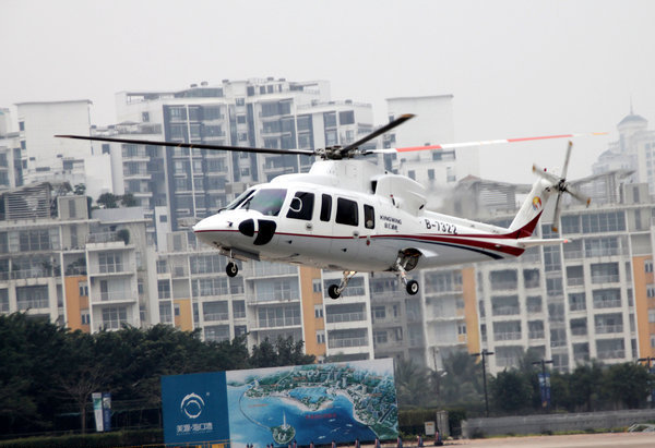 A helicopter takes off for a test-fly in Haikou, capital of South China&apos;s Hainan province, Jan 28, 2011.[CFP] 