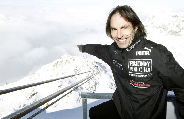 Swiss acrobat Freddy Nock poses in front of the cable of a funicular on the Mount Corvatsch (3,303 m) near the Swiss mountain resort of St. Moritz January 29, 2011. Nock walked down the cable over a distance of some 1,600 metres from the mountain station of the cable car in 3,303 metres altitude to the middle station (2,702 metres altitude).[China Daily/Agencies] 