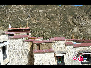 Situated at the foot of the Mountain Gambo Utse, ten kilometers (3.1 miles) to the western suburb of Lhasa, the Drepung Monastery is the most important monastery of Gelugpa in Tibetan Buddhism. Together with the Ganden Monastery and the Sera Monastery, Drepung Monastery is taken as one of the 'Three Great Monasteries' in Lhasa. [Photo by Chen Zhu] 