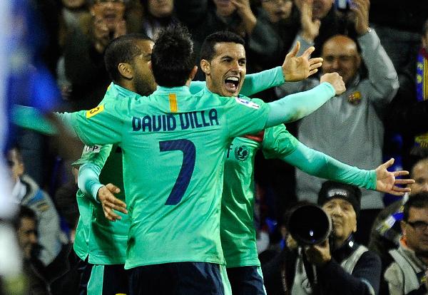 Barcelona's forward Pedro Rodriguez (R) celebrates his goal with teammates during the Spanish league football match Hercules CF vs FC Barcelona on January 29, 2011 at the Jose Rico Perez stadium in Alicante. [Xinhua] 