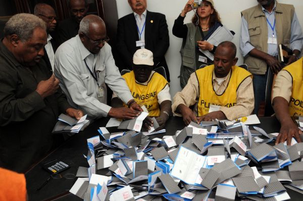 The file photo taken on Jan. 15, 2011 shows staff members of a polling center prepare to count the ballots in Khartoum, capital of Sudan. Over 98 percent of the votes cast in the southern Sudan referendum earlier this month favor the autonomous region seceding from Sudan, according to authoritative preliminary results published on Sunday. [Xinhua]