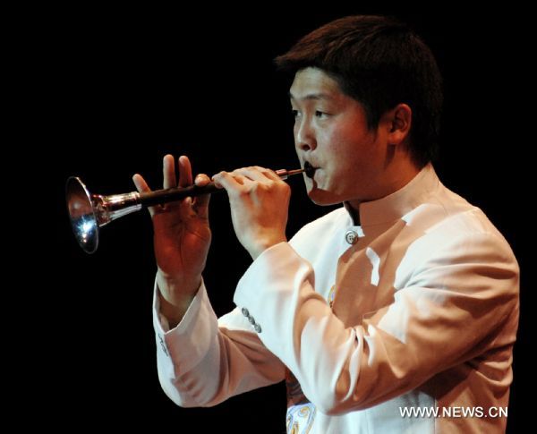 A Chinese musician from the Wu Opera Troupe of Zhejiang Province performs at the Havana's National Theater in Havana, capital of Cuba, Jan. 29, 2011. Founded in 1956, the Wu Opera Troupe of Zhejiang has dedicated to rescuing and restoring the Wu opera, the second major theatrical genre in Zhejiang with a history of over 400 years.