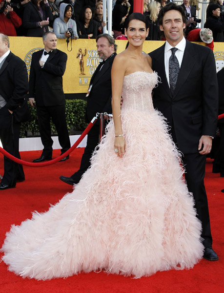 Actress Angie Harmon and her husband Jason Sehorn arrive at the 17th annual Screen Actors Guild Awards in Los Angeles, California January 30, 2011.