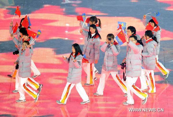 Members of China's delegation enter the site during the opening ceremony of the 7th Asian Winter Games in Astana, capital of Kazakhstan. The 7th Asian Winter Games lasts from Jan. 30 to Feb. 6. 