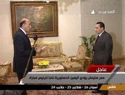 Egyptian President Hosni Mubarak (R) swears in Omar Suleiman as vice president in Cairo in this video frame grab taken January 29, 2011.  