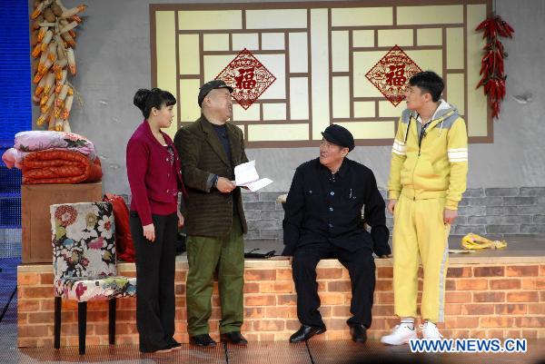 Comedy actress Li Lin, actors Wang Xiaoli, Zhao Benshan and Xiaoshenyang (L to R) perform during a rehearsal of the Spring Festival Gala Evening at China Central Television (CCTV) in Beijing, capital of China, Jan. 31, 2011.