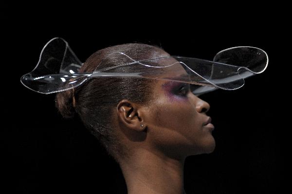 A model presents a creation by designer Fernanda Yamamoto during the closing day of 2011-2012 Fall-Winter collections of the Sao Paulo Fashion Week in Sao Paulo, Brazil, on February 2, 2011.