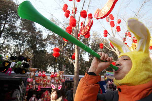 The Spring Festival cultural temple fair is held in Ditan Park, Beijing, capital of China, Feb. 2, 2011. Variety of goods related to bunny are well received by visitors at temple fairs kicked off in Beijing on Wednesday, the Chinese Lunar New Year's Eve.