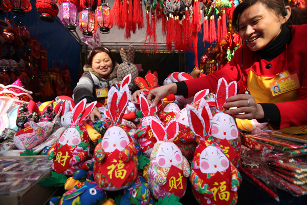 The Spring Festival cultural temple fair is held in Ditan Park, Beijing, capital of China, Feb. 2, 2011. Variety of goods related to bunny are well received by visitors at temple fairs kicked off in Beijing on Wednesday, the Chinese Lunar New Year's Eve. [Xinhua photo]